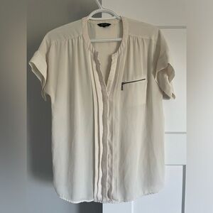 Ivory sheer shirt with zipper pocket and double pleat on the back